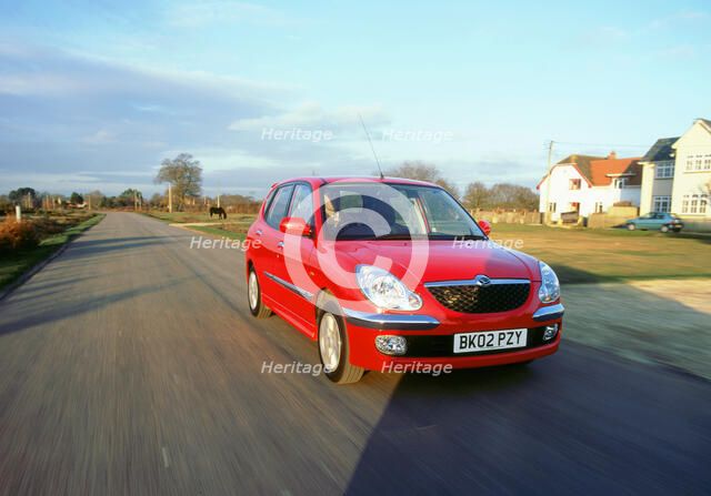 2002 Daihatsu Sirion 1.3 SL. Artist: Unknown.