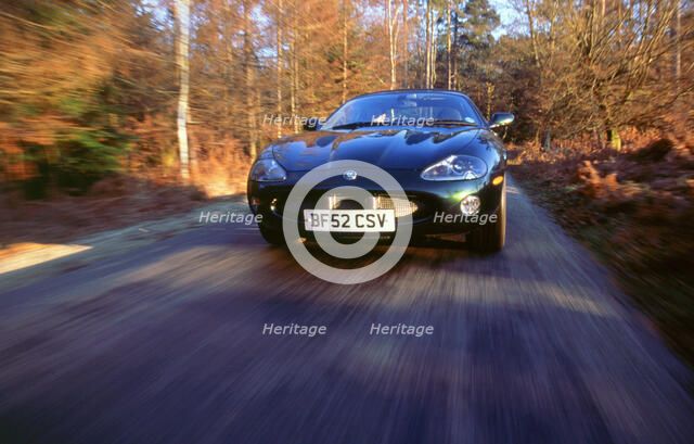 2002 Jaguar XKR convertible. Artist: Unknown.