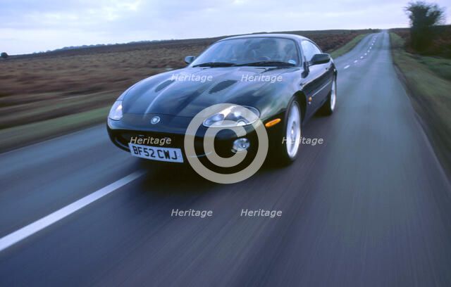 2002 Jaguar XKR coupe. Artist: Unknown.