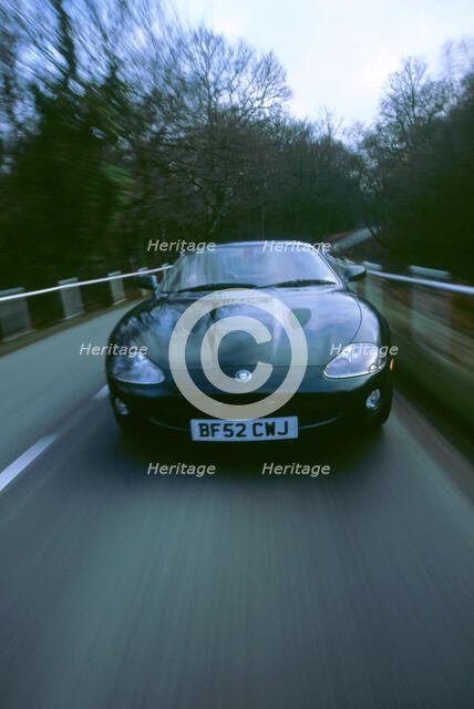 2002 Jaguar XKR coupe. Artist: Unknown.