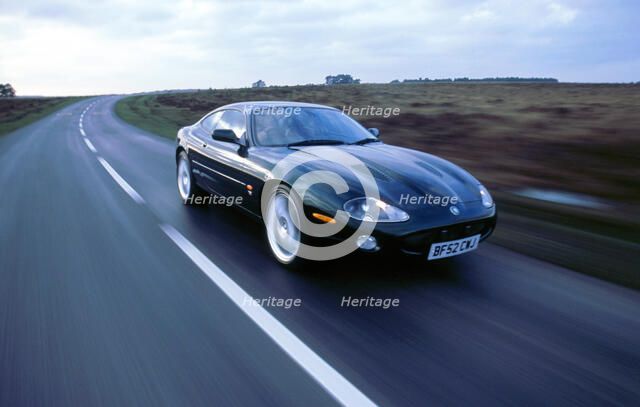 2002 Jaguar XKR coupe. Artist: Unknown.