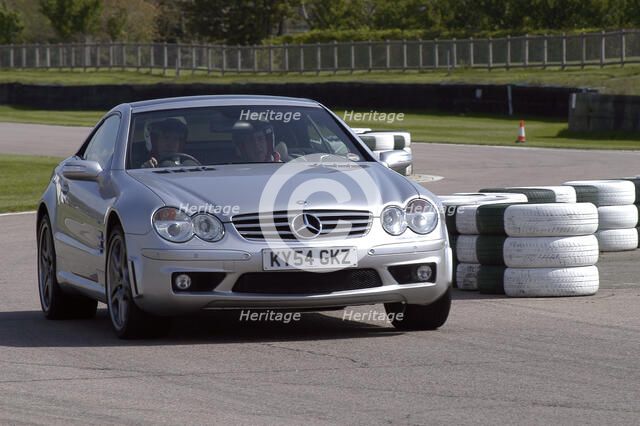 2004 Mercedes Benz 600 SLV12 Artist: Unknown.