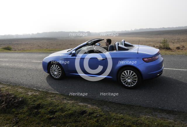 2006 Alfa Romeo Spyder driving in New Forest. Artist: Unknown.