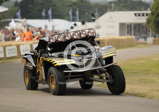 2009 Trophy Truck off road racer at Goodwood Artist: Unknown.