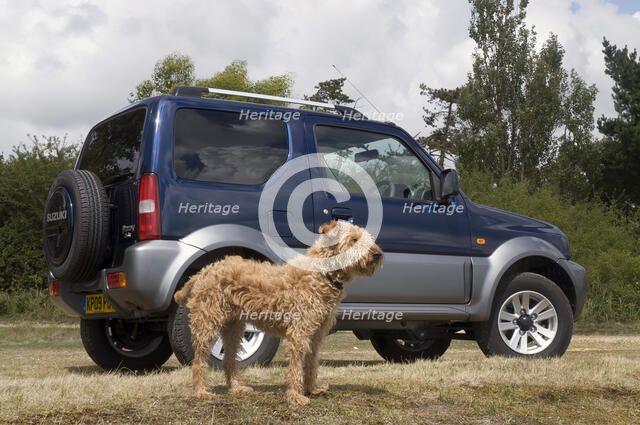 2009 Suzuki Jimny SZ4 with pet dog Artist: Unknown.