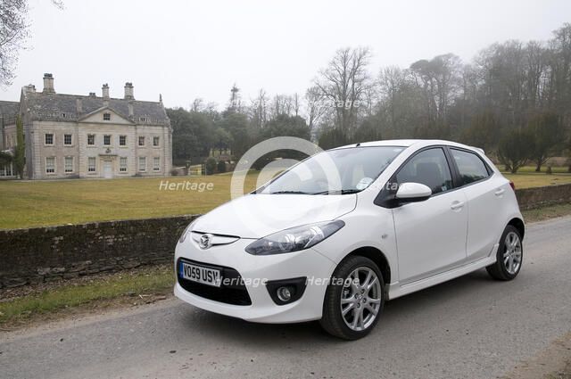 2010 Mazda 2 Sport Artist: Unknown.