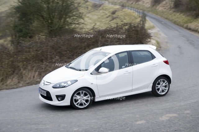 2010 Mazda 2 Sport Artist: Unknown.