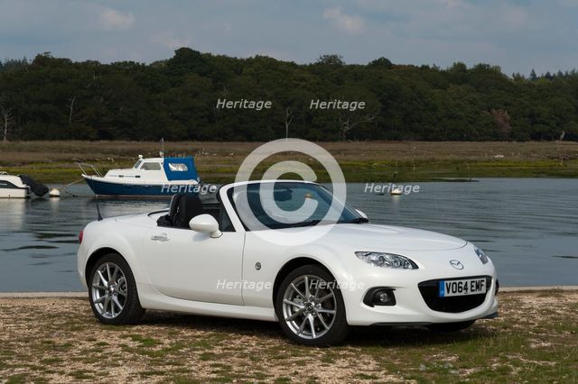 2014 Mazda MX5 Roadster Coupe Artist: Unknown.