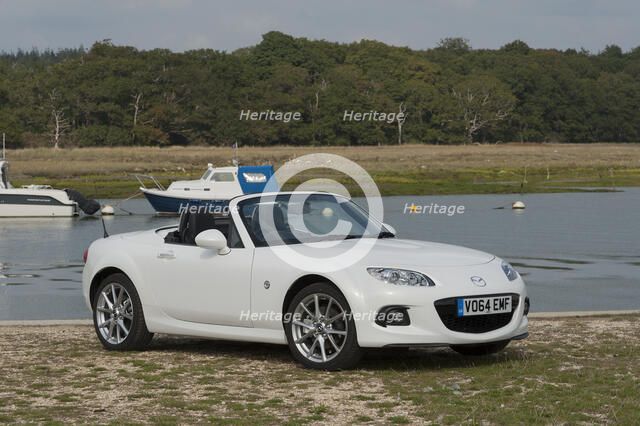 2014 Mazda MX5 Roadster Coupe Artist: Unknown.