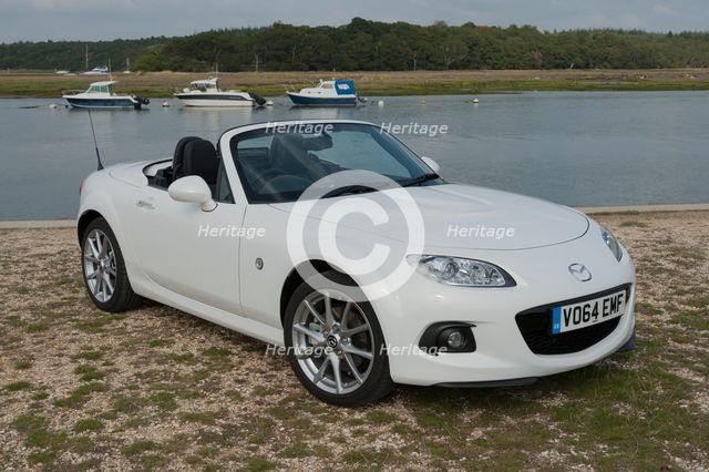 2014 Mazda MX5 Roadster Coupe Artist: Unknown.