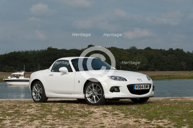 2014 Mazda MX5 Roadster Coupe Artist: Unknown.