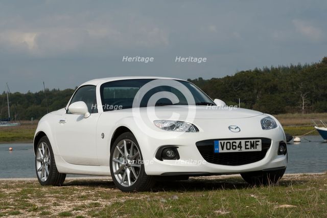 2014 Mazda MX5 Roadster Coupe Artist: Unknown.