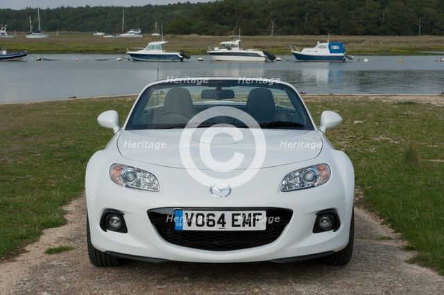 2014 Mazda MX5 Roadster Coupe Artist: Unknown.