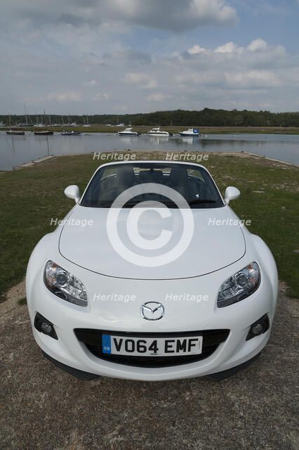 2014 Mazda MX5 Roadster Coupe Artist: Unknown.