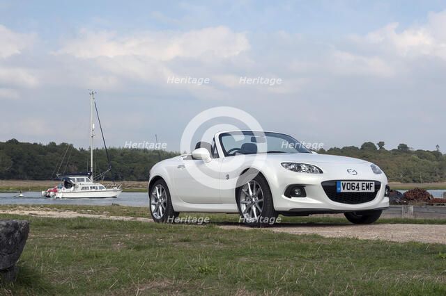 2014 Mazda MX5 Roadster Coupe Artist: Unknown.