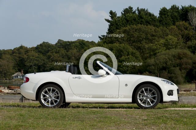 2014 Mazda MX5 Roadster Coupe Artist: Unknown.