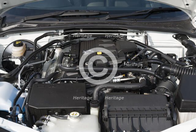 2014 Mazda MX5 Roadster Coupe Artist: Unknown.