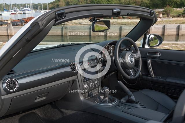 2014 Mazda MX5 Roadster Coupe Artist: Unknown.