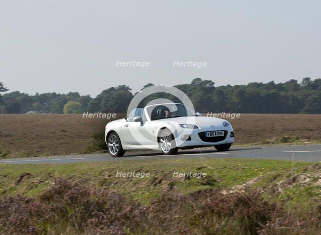 2014 Mazda MX5 Roadster Coupe Artist: Unknown.