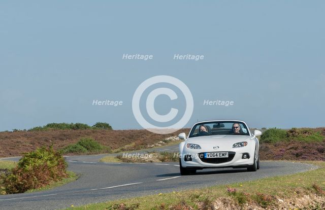 2014 Mazda MX5 Roadster Coupe Artist: Unknown.