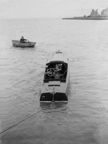21 Footer motor launch showing engines, 1914. Creator: Kirk & Sons of Cowes