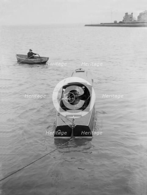 21 Footer motor launch showing engines, 1914. Creator: Kirk & Sons of Cowes.