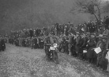 250 cc Triumph of J Stagg competing in the MCC Lands End Trial, Beggars Roost, Devon, 1936. Artist: Bill Brunell