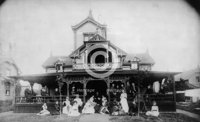 27 men and women (Johnston family) in front of beach house "Dartmouth", c1880. Creator: Unknown.