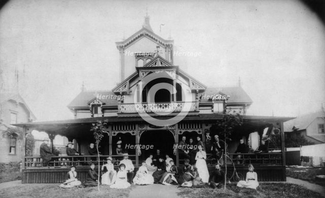 27 men and women (Johnston family) in front of beach house "Dartmouth", c1880. Creator: Unknown.
