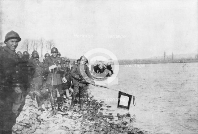 2nd Moroccan division bathes its flags in the Rhine, Huningue, Alsace, France, 21 November 1918. Artist: Unknown
