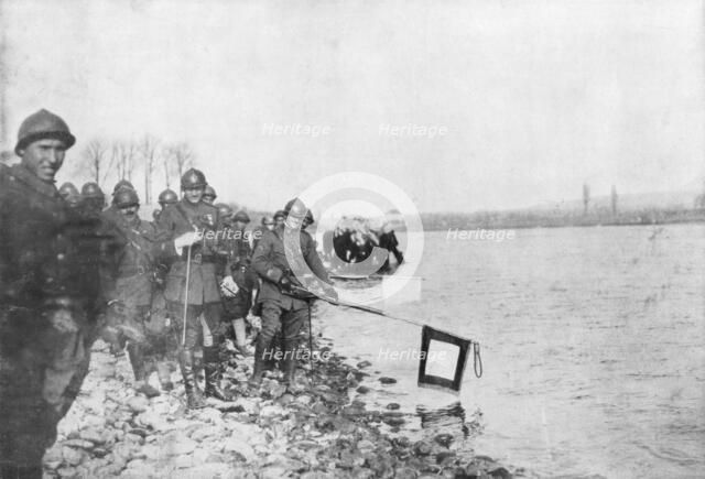 2nd Moroccan division bathes its flags in the Rhine, Huningue, Alsace, France, 21 November 1918. Artist: Unknown