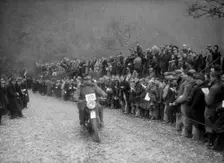 347 cc AJS of J Hey competing in the MCC Lands End Trial, Beggars Roost, Devon, 1936. Artist: Bill Brunell