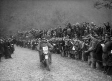 347 cc AJS of J Hey competing in the MCC Lands End Trial, Beggars Roost, Devon, 1936. Artist: Bill Brunell