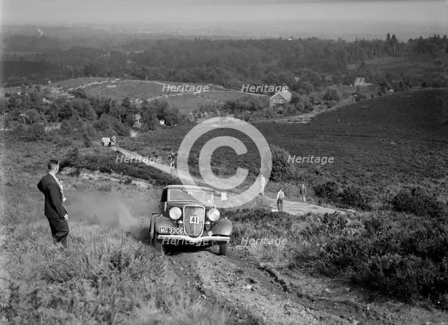 3622 cc Ford V8 tourer taking part in the NWLMC Lawrence Cup Trial, 1937. Artist: Bill Brunell.