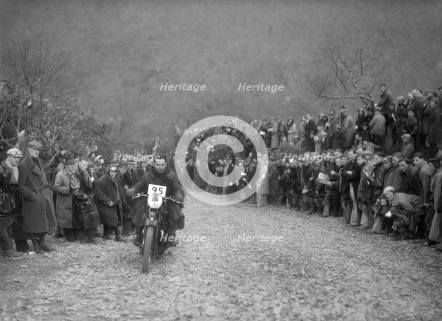 498 cc Ariel of JA Haywood competing in the MCC Lands End Trial, Beggars Roost, Devon, 1936. Artist: Bill Brunell.