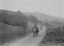 493 cc Triumphs of L Crisp and KP Jones competing in E&DMC Scottish 6 Days Trial, 1933.. Artist: Bill Brunell