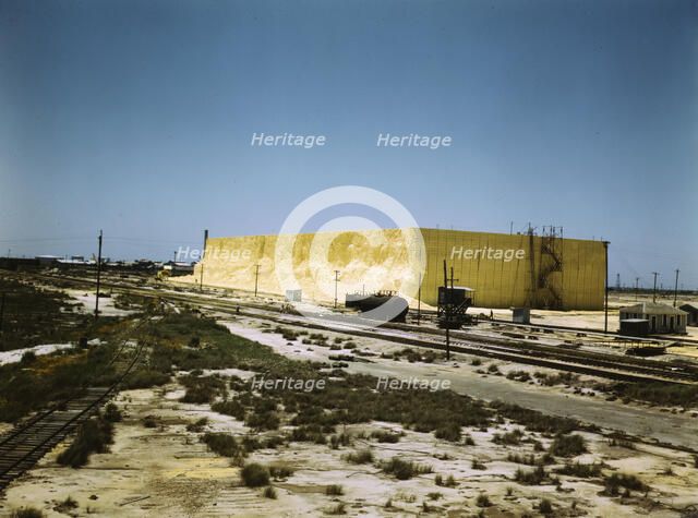 60 foot high sulphur vat, Freeport Sulphur Co., Hoskins Mound, Texas, 1943. Creator: John Vachon.