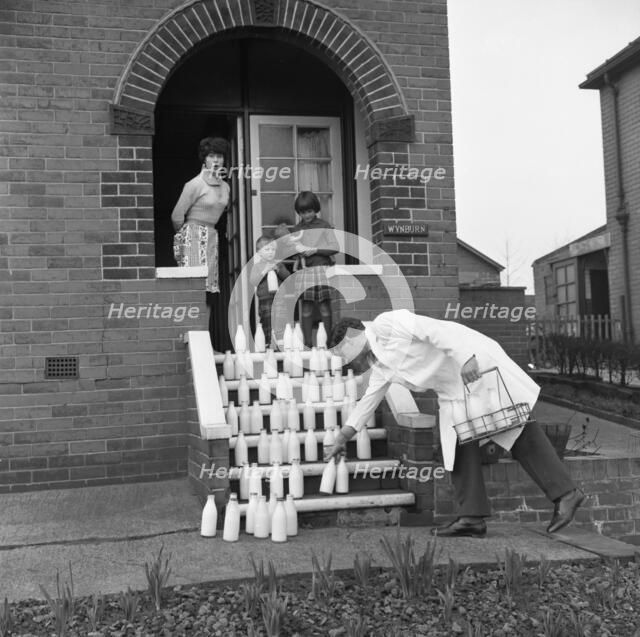 60 pints of milk, advertisment for the Barnsley Co-op, Mexborough, South Yorkshire, 1964. Artist: Michael Walters