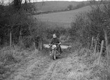 600 cc Ariel Square Four of HLS Sikes competing in the Inter-Varsity Trial, November 1931. Artist: Bill Brunell