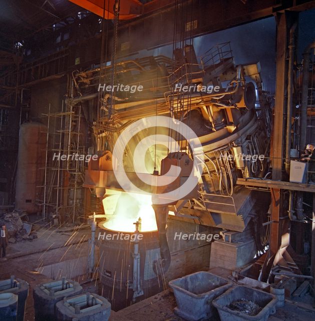75 ton arc furnace pouring molten steel into a vessel, Sheffield, South Yorkshire, 1969. Artist: Michael Walters