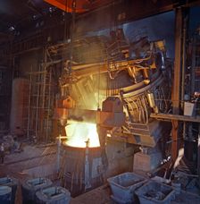 75 ton arc furnace pouring molten steel into a vessel, Sheffield, South Yorkshire, 1969. Artist: Michael Walters