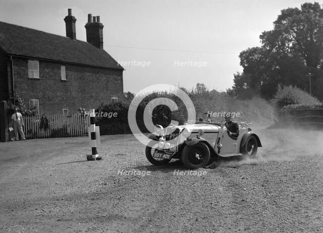 972 cc Singer competing in the Singer CC Rushmere Hill Climb, Shropshire 1935. Artist: Bill Brunell.