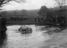 972 cc Singer Le Mans driving through a ford during a motoring trial, 1936. Artist: Bill Brunell