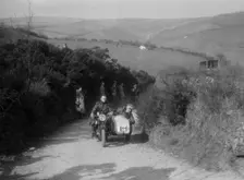 990 cc AJS and sidecar of M Laidlaw at the MCC Lands End Trial, Beggars Roost, Devon, 1936. Artist: Bill Brunell