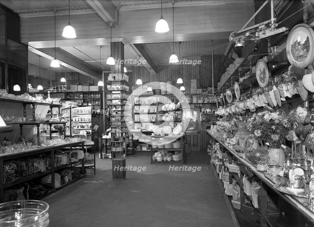 Co-op store showing a sales receipt transfer system, Barnsley, South Yorkshire, 1955. Artist: Michael Walters