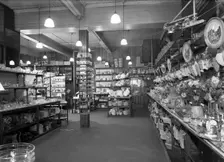 Co-op store showing a sales receipt transfer system, Barnsley, South Yorkshire, 1955. Creator: Michael Walters