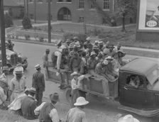 Cotton hoers are transported to the fields daily during the season, Memphis, Tennessee, 1937. Creator: Dorothea Lange