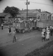 Cotton hoers from Memphis, Tennessee are carried by trucks to the Arkansas plantations, 1937. Creator: Dorothea Lange