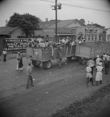 Cotton hoers from Memphis, Tennessee are carried by trucks to the Arkansas plantations, 1937. Creator: Dorothea Lange