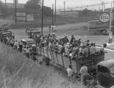 Cotton hoers loading at Memphis, Tennessee for the day's work in Arkansas, 1937. Creator: Dorothea Lange